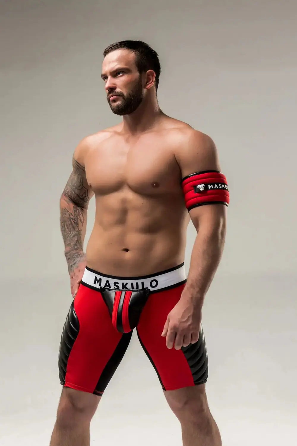 Maskulo red Armored Biceps Armband Wallet for young men, featuring black padding, zipper pocket, and logo patch
