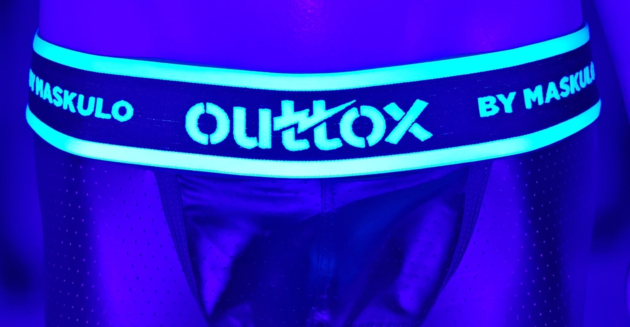 Outtox by Maskulo Black Leggings: perforated PU eco-leather, polyester blend, snap codpiece, zippered rear, logo waistband. XLG107.