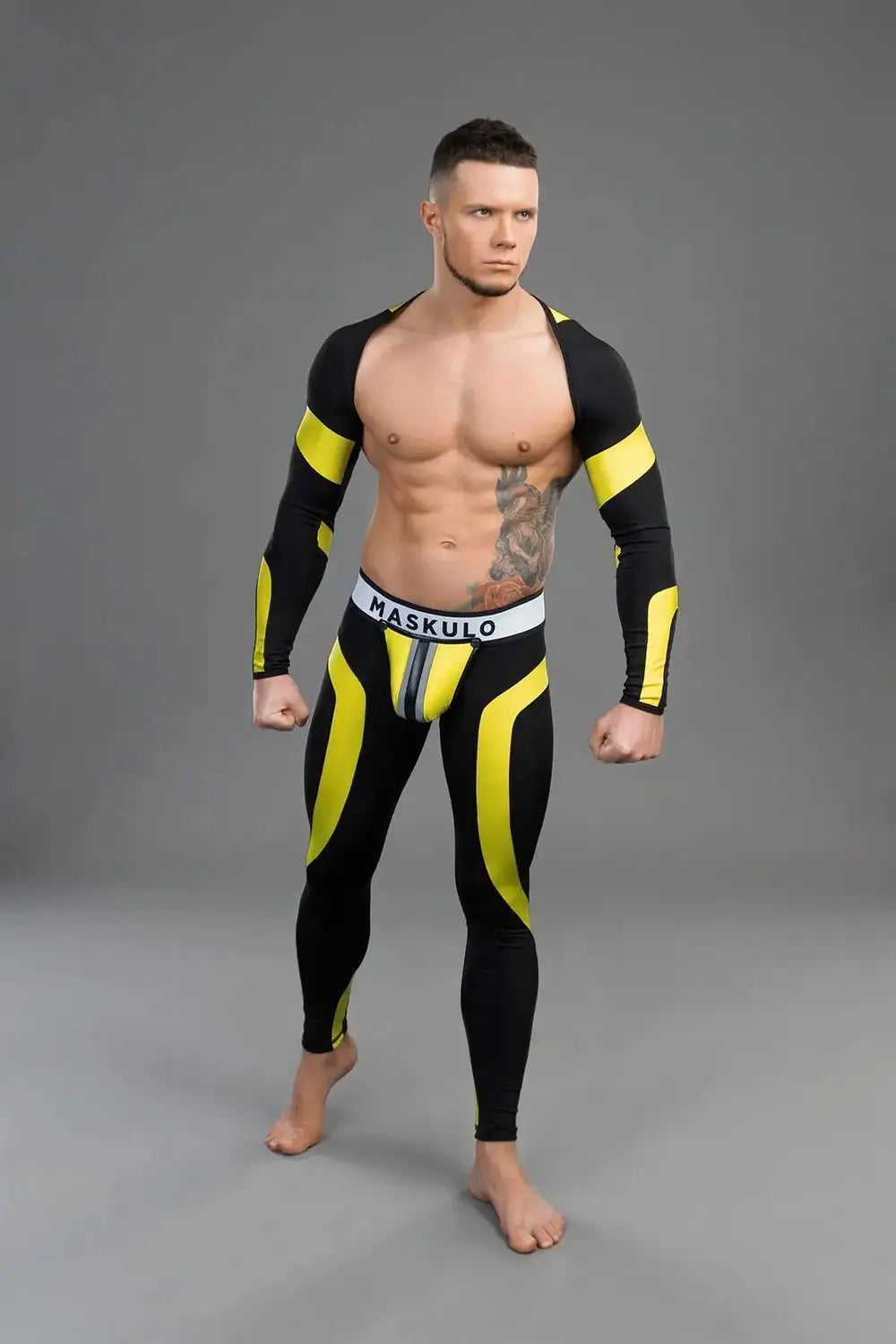 Maskulo Youngero yellow/black long sleeve fetish crop top for men, appealing to young urban professionals and gender-fluid Gen Z