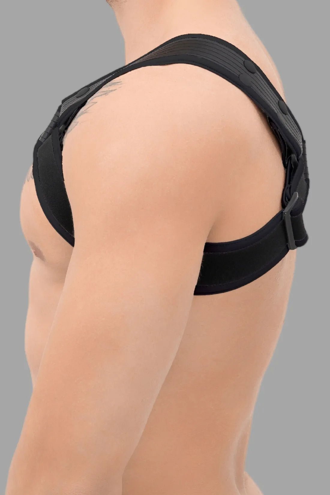 Outtox Body Harness with Snaps in black by Maskulo. A sleek accessory (XHR118) for men, with a secure fit and durable design.