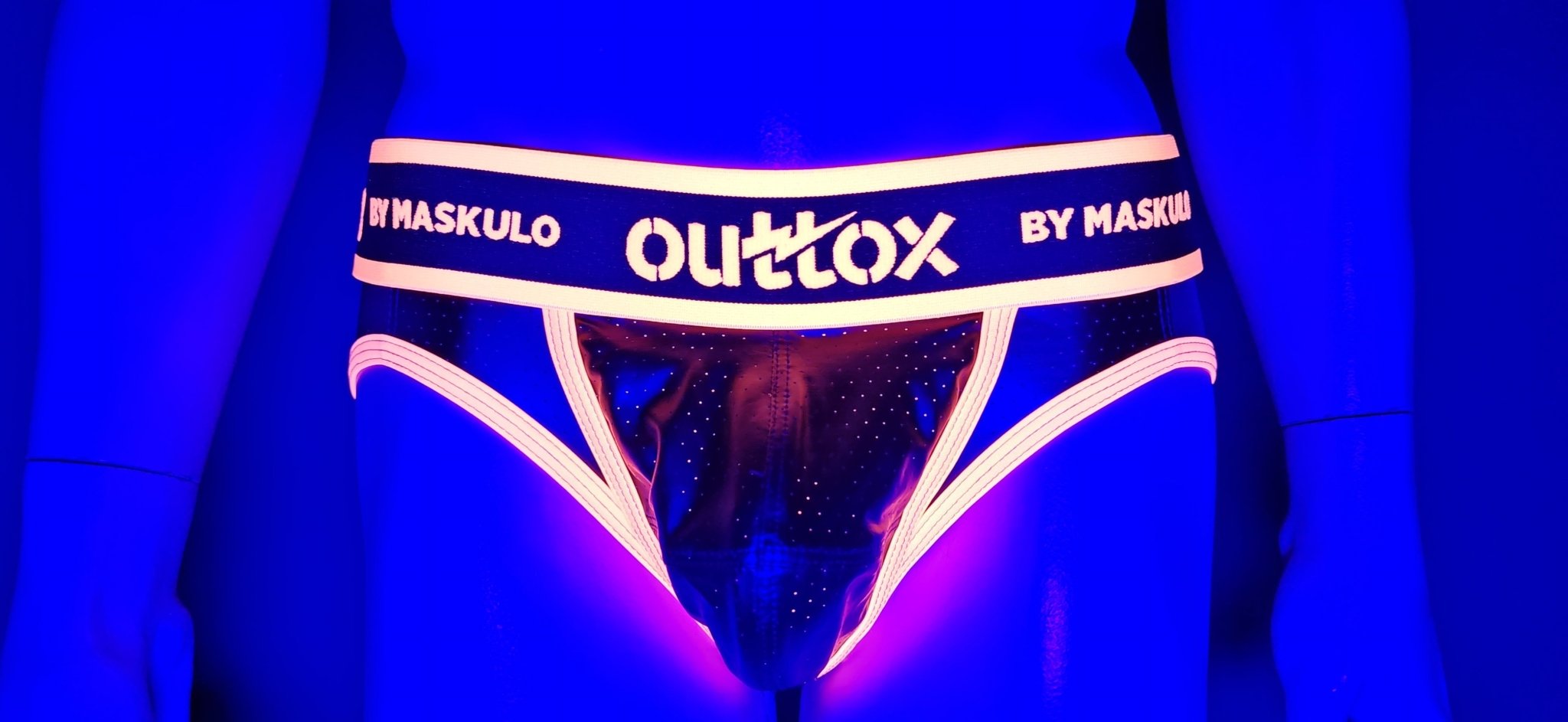 Maskulo Outtox open rear shorts with snap codpiece in orange, size XL. Durable, statement shorts for adults.
