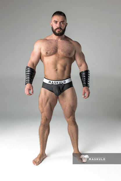 Armored. Rubber look Briefs. Detachable pouch. Zippered rear. Black